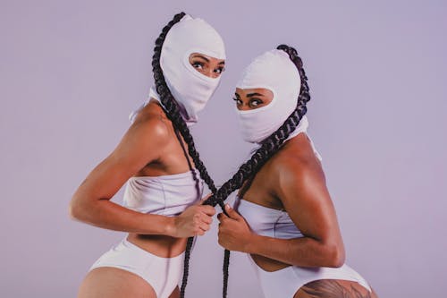 Women Posing in Bikini and Balaclavas 