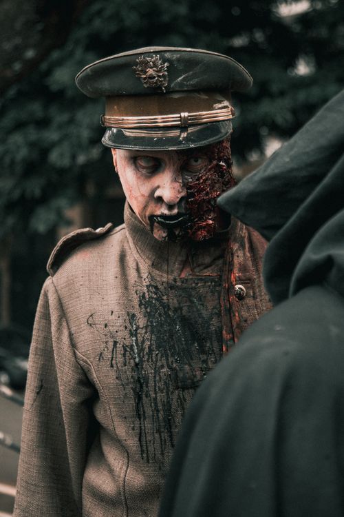 Free A zombie in a military uniform with gruesome makeup, captured in São Paulo. Stock Photo