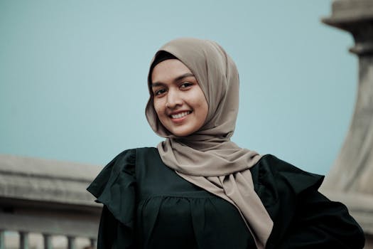 Portrait of a stylish woman in a hijab enjoying a day out in Putrajaya, Malaysia.