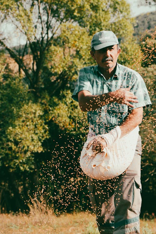 Man Scattering Seeds in a Field