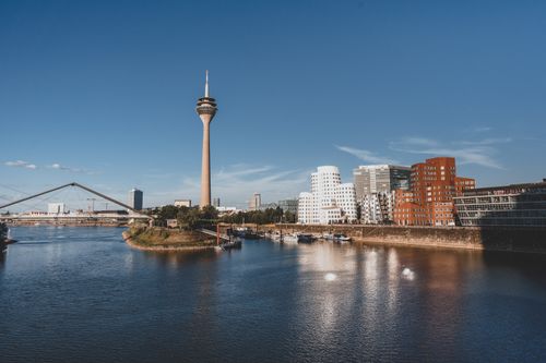 Free Scenic view of Düsseldorf's skyline featuring the Rheinturm and modern architecture at Media Harbor. Stock Photo