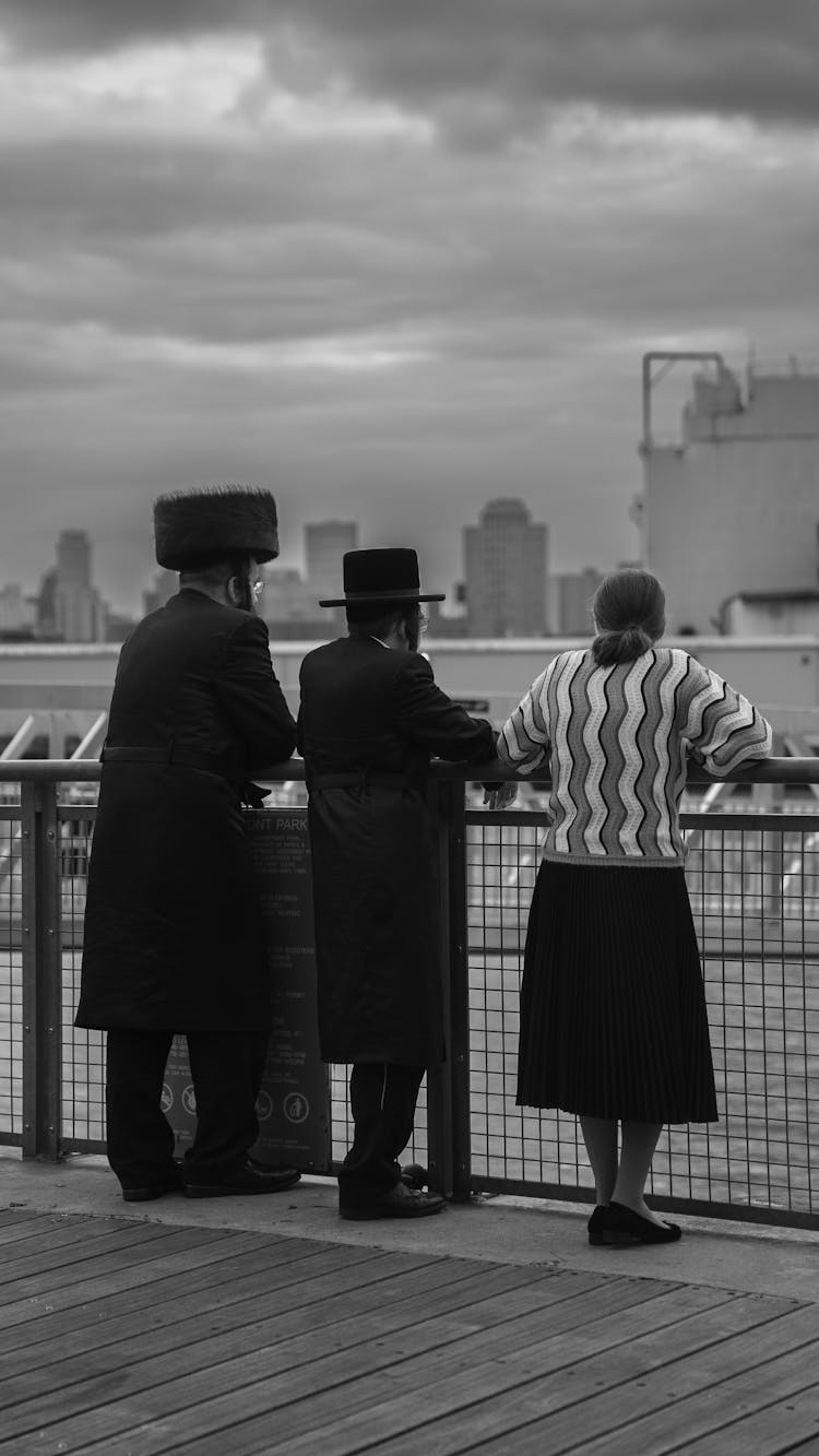 People Standing In A City