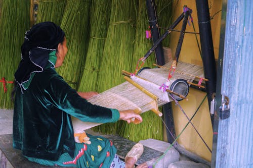 Woman Weaving on Traditional