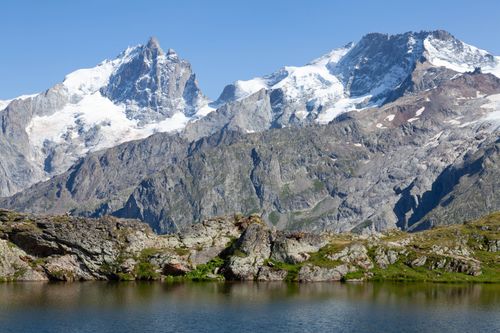 Free Stunning view of snow-capped peaks in the Massif des Écrins, La Grave, France. Stock Photo
