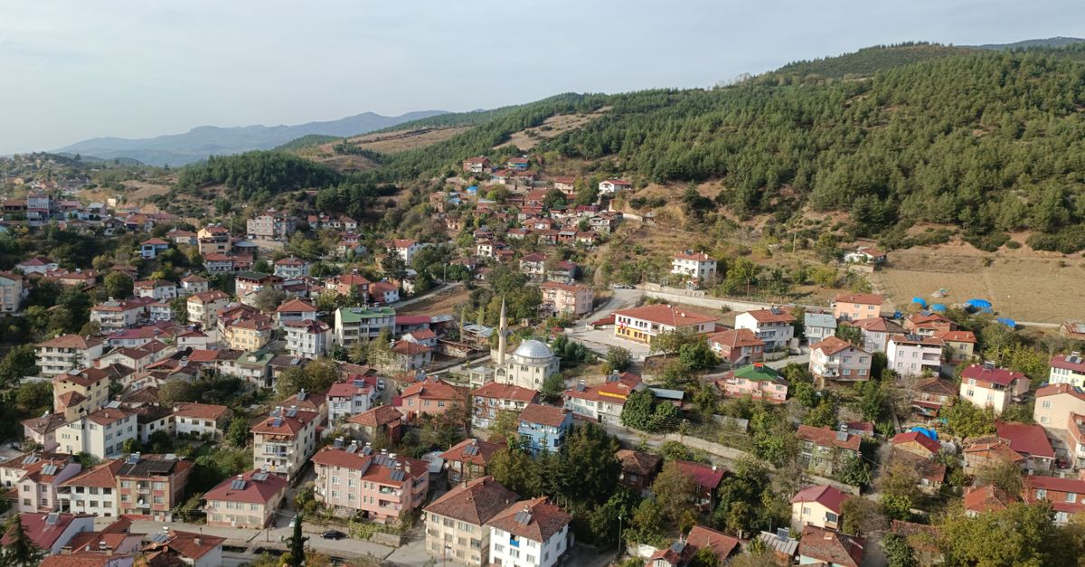 Aerial view of Ho Municipality showing the central market and surrounding hills