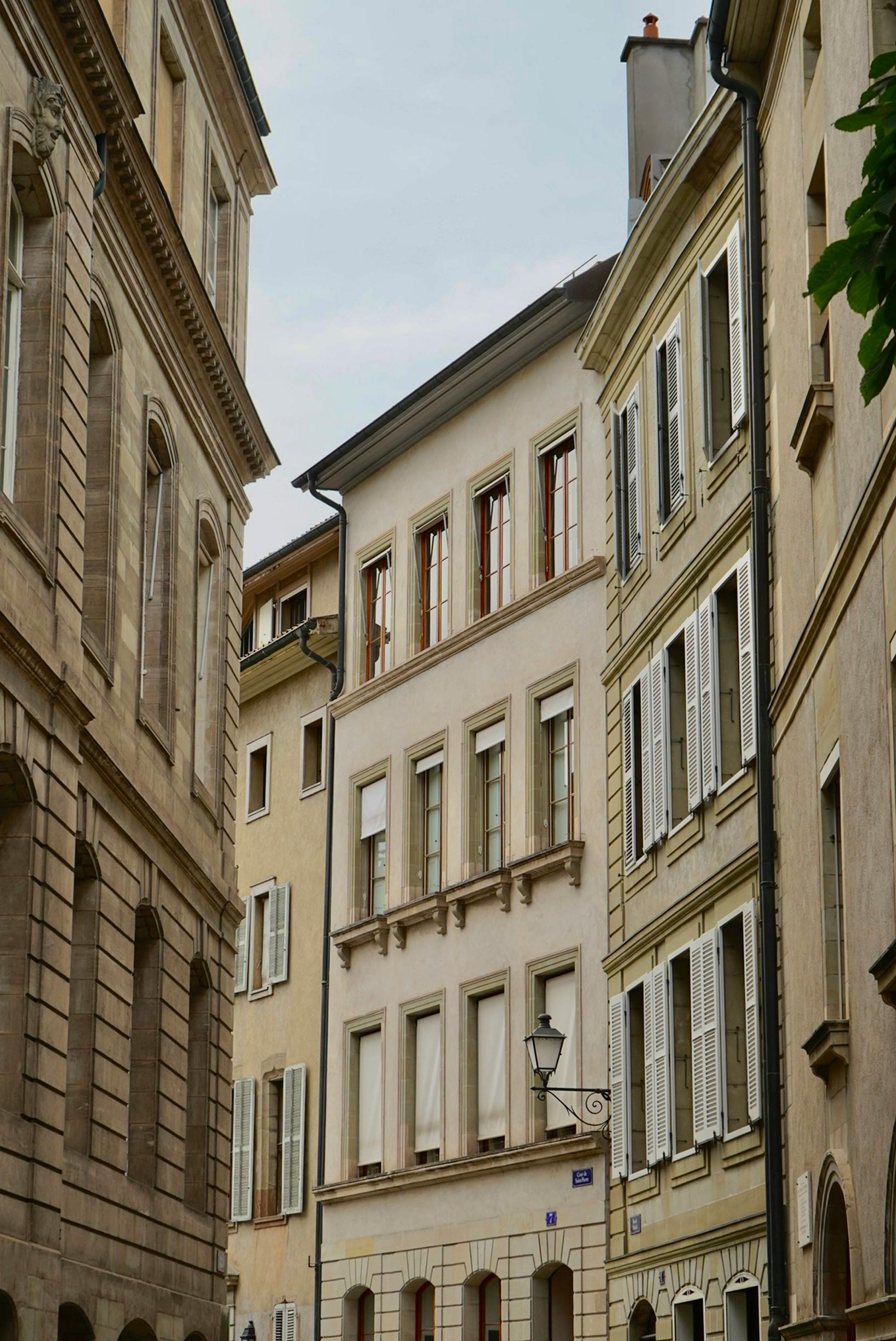 Elegant residential buildings showcasing classic architecture in Geneva, Switzerland.