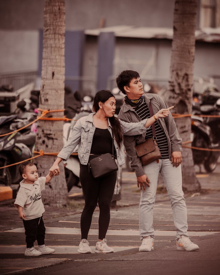 Family Standing On Crosswalk