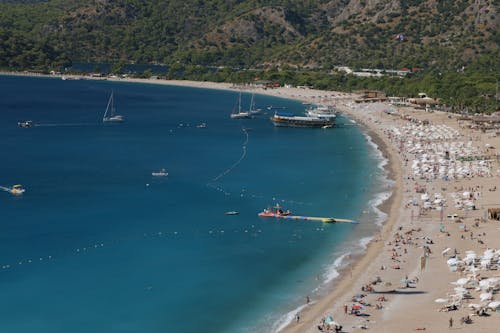 Birds Eye View of Tourists Relaxing on the Beach 