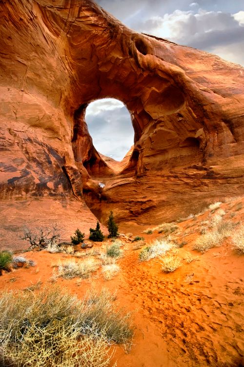 Free Captivating image of Ear of the Wind Arch in the iconic Monument Valley. Stock Photo