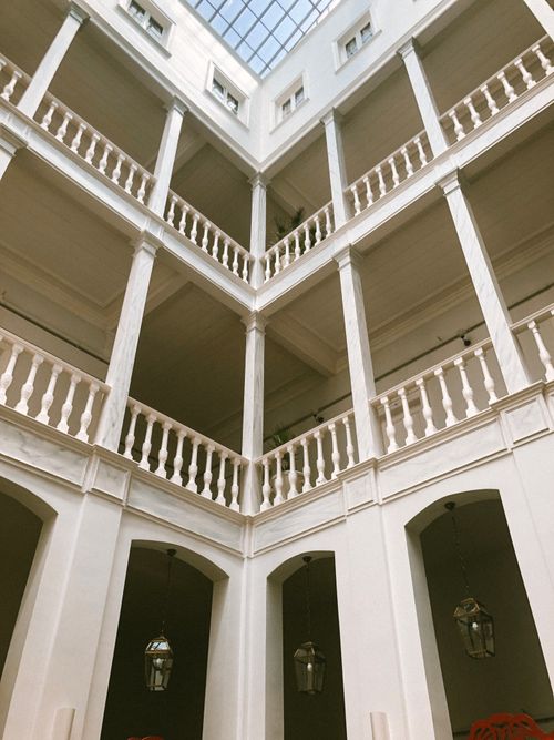 Free Discover the luxury of an elegant interior courtyard with balconies in Istanbul, Turkey's Adalar district. Stock Photo