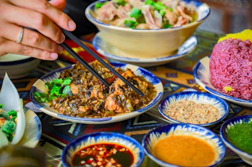 Free Person Eating Asian Lunch Stock Photo