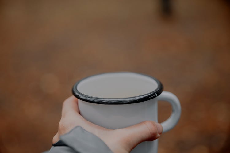 Enamel Mug In Hand