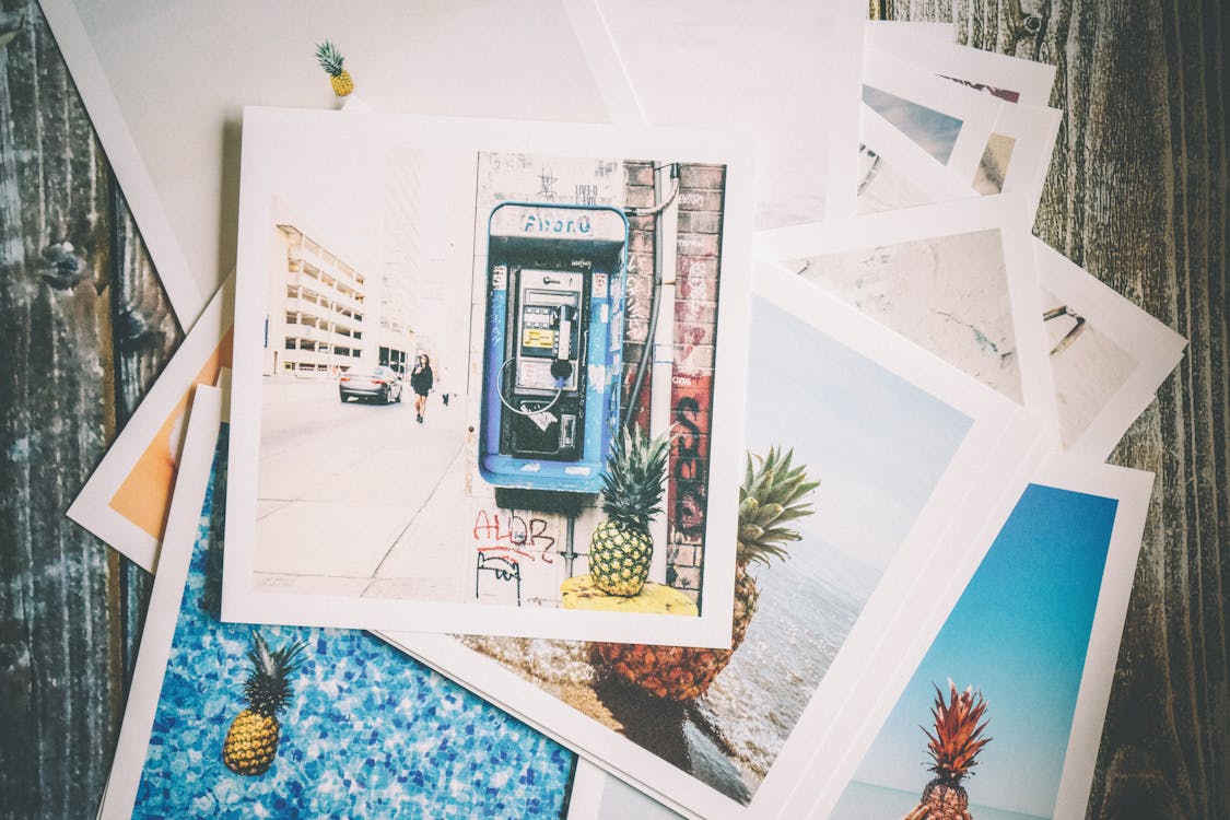 Free Pile Of Assorted Photos Stock Photo