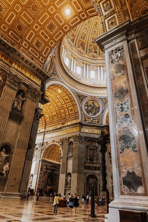 Free Explore the grandeur and detailed ornamentation inside St. Peter's Basilica in Vatican City, Italy. Stock Photo