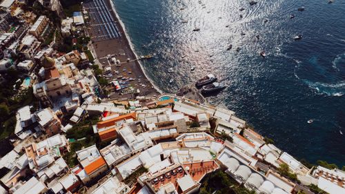 Free A breathtaking aerial view of Positano, Italy showcasing vibrant architecture and serene sea. Stock Photo