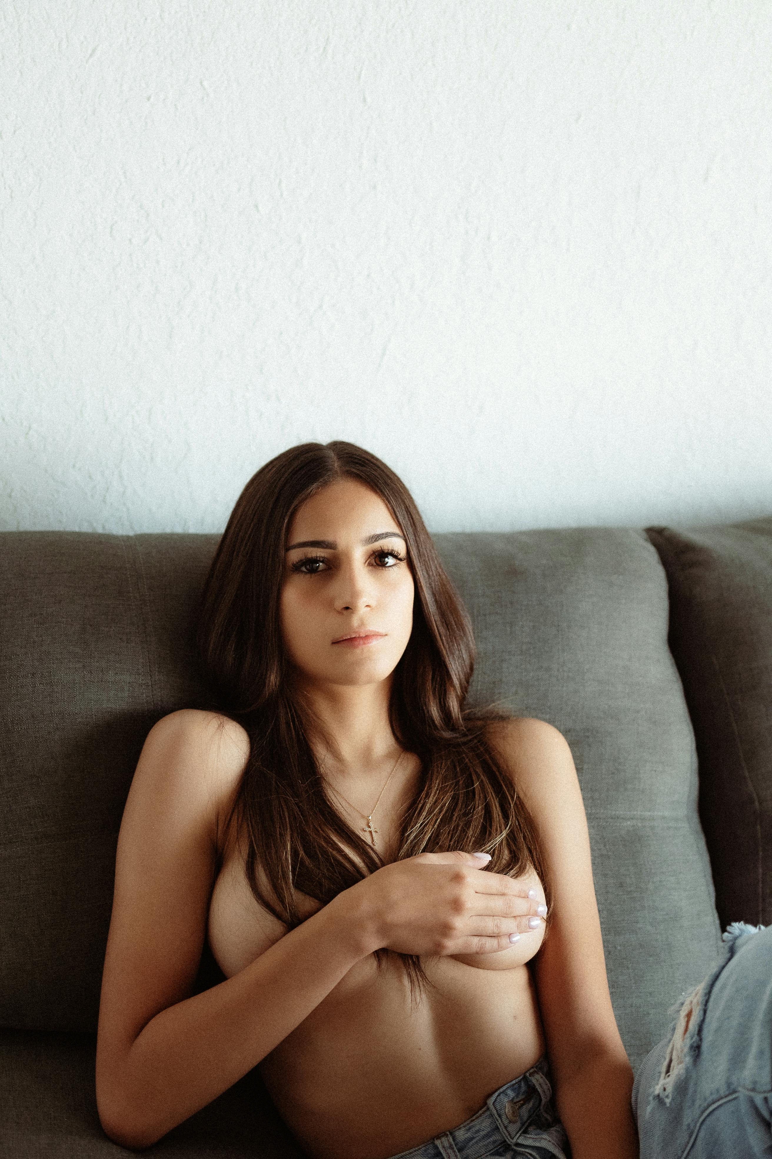 Topless Young Woman Covering Herself with Hand · Free Stock Photo