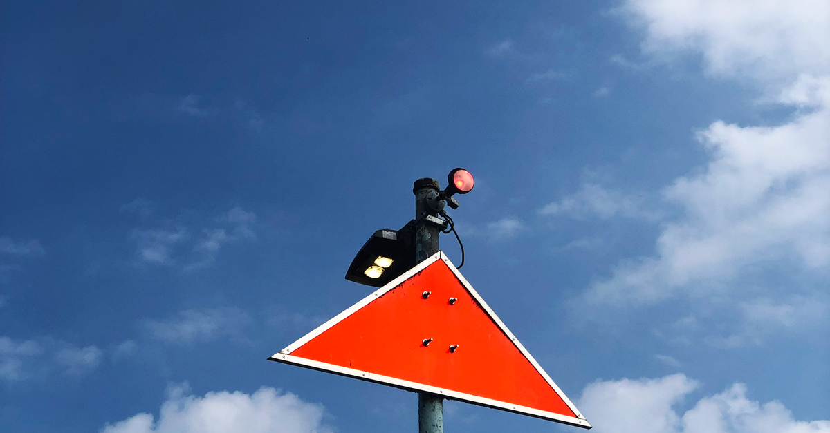 A Speed Camera on a Triangle Sign · Free Stock Photo