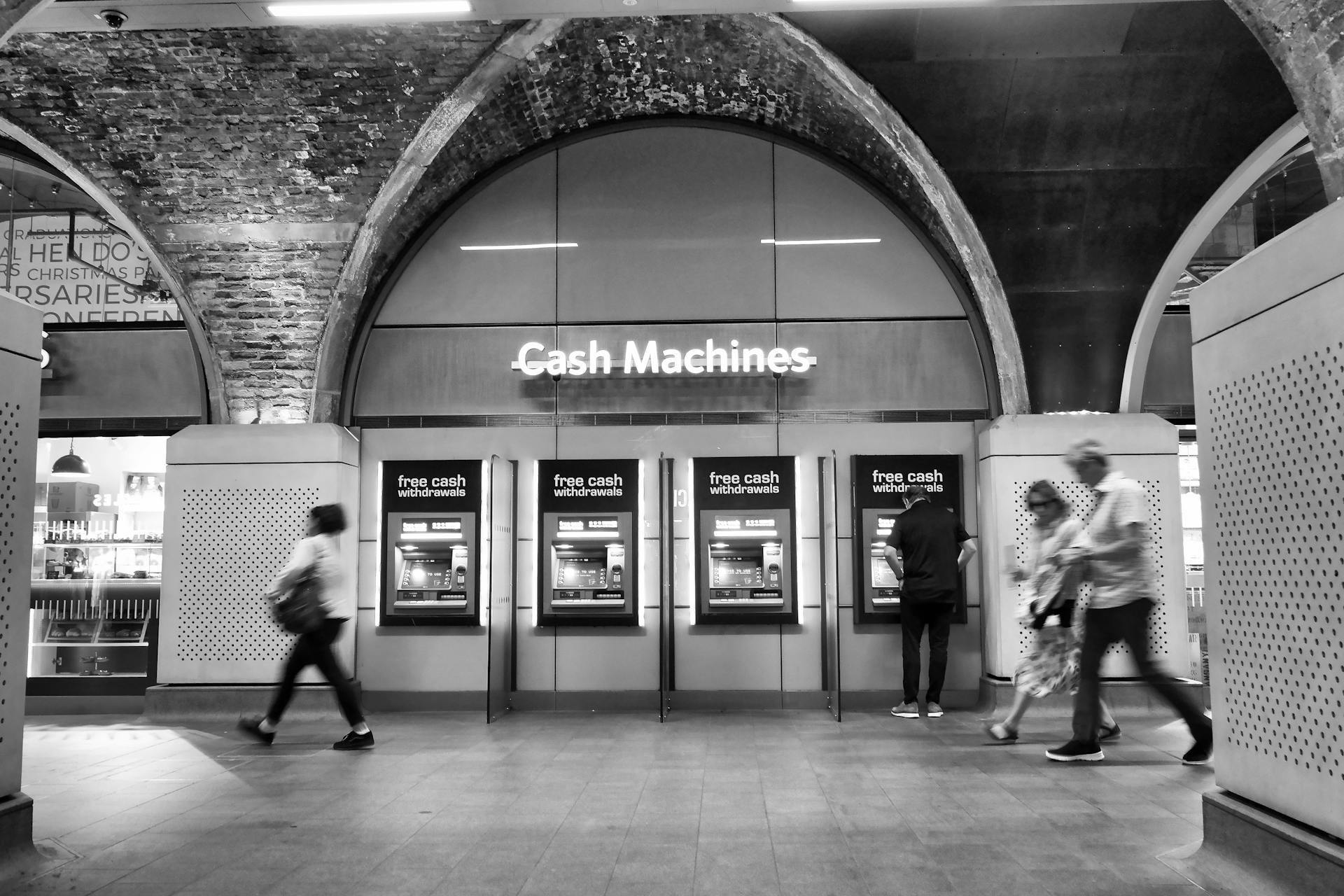 Cash Machines on a Station in Black and White