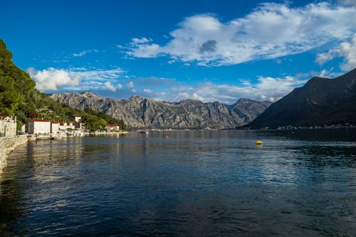 Town by Lake in Mountains