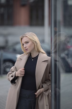 Woman in double-breasted winter coat