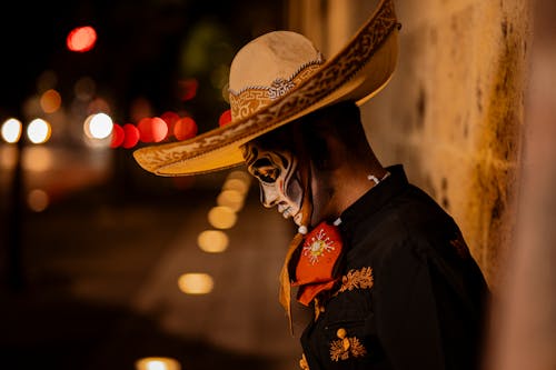 Man Wearing Traditional Mexican Costume on a Street
