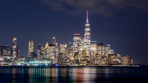 Manhattan Skyscrapers on Coast at Night