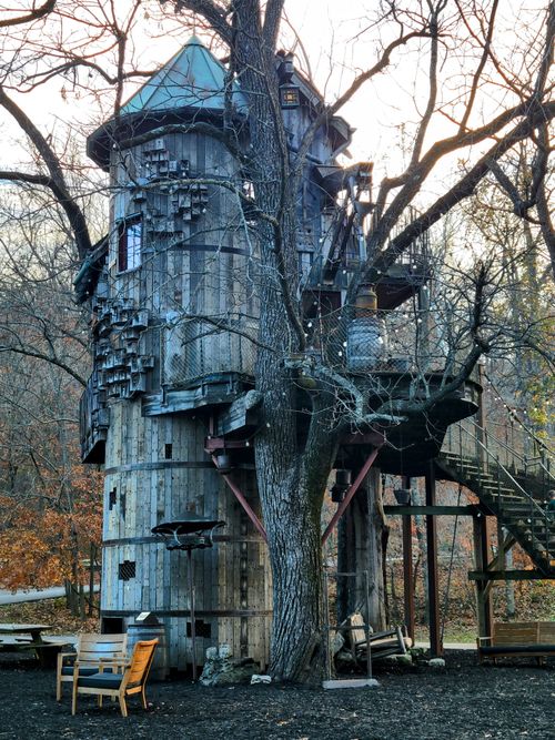 Free Explore a whimsical wooden treehouse nestled in the woods of Lampe, Missouri, USA. Stock Photo