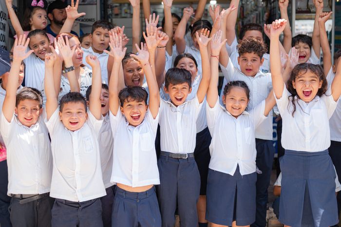 Children cheering together