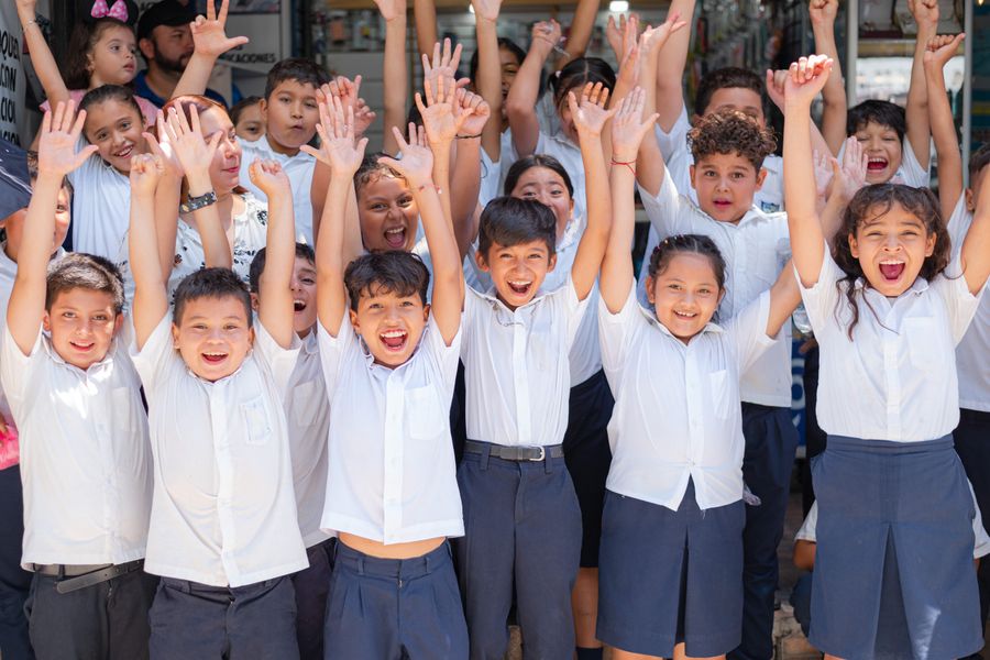 A cheering group of children