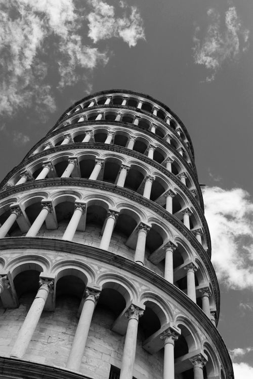 Free Striking black and white photograph of the iconic Leaning Tower of Pisa in Italy. Stock Photo