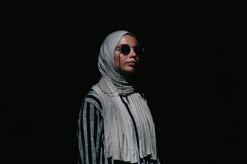 Woman in Sunglasses and Headscarf