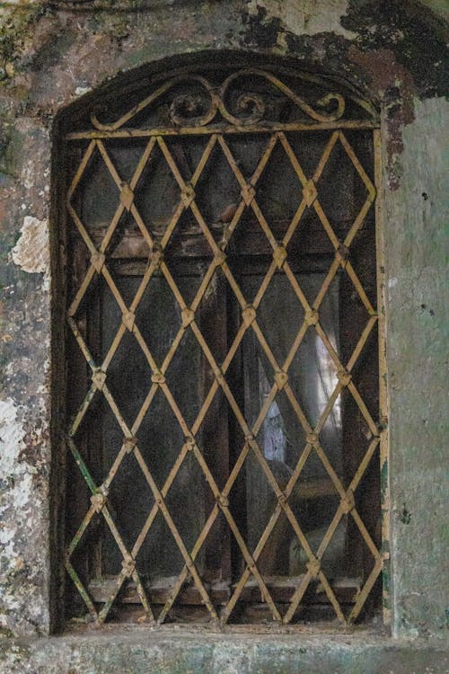 Barred Window in an Old Building 