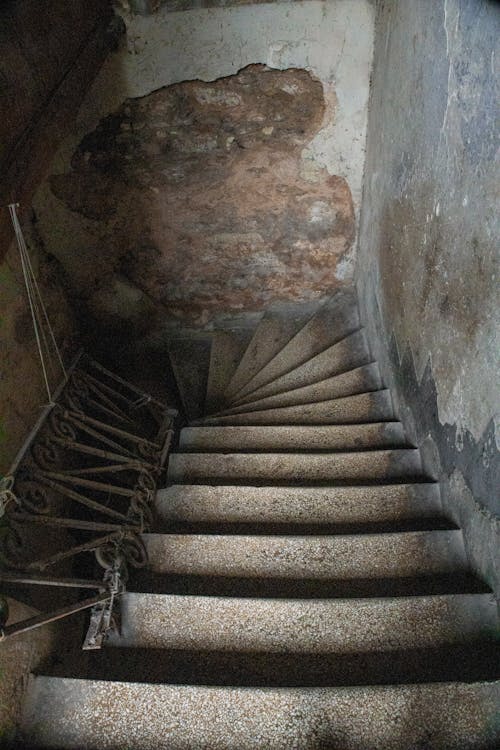 View of a Staircase in an Old Abandoned Building 