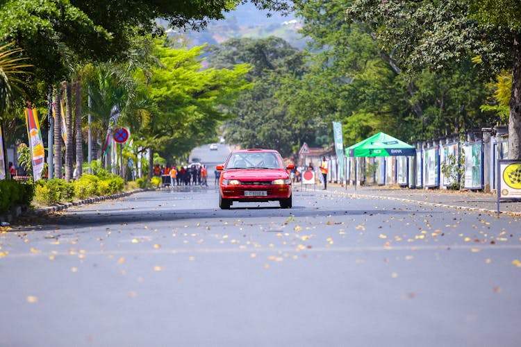 Racing Version Of Sixth Generation Toyota Corolla GT Rushes Down The Street