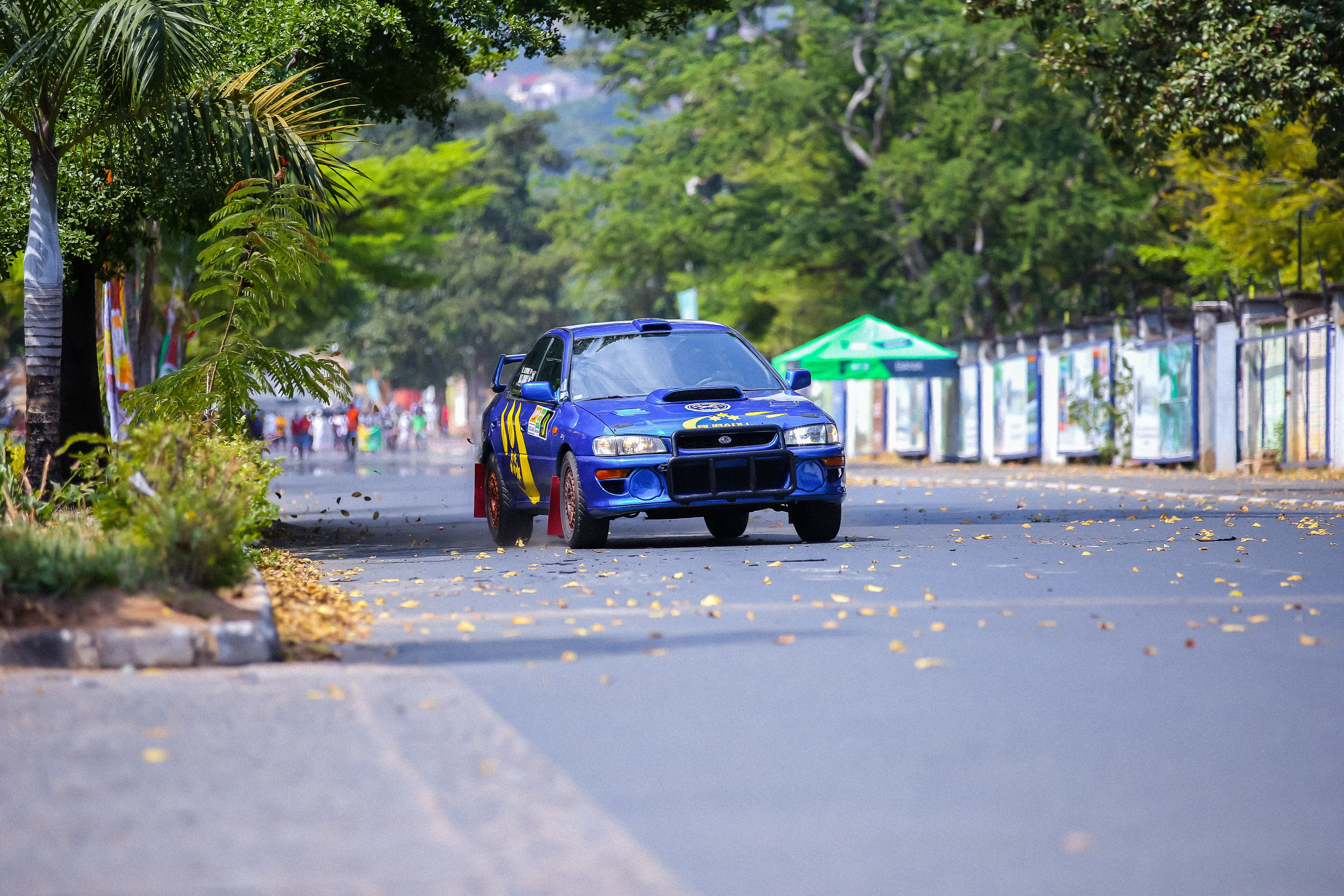 Blue Car on a Championship · Free Stock Photo
