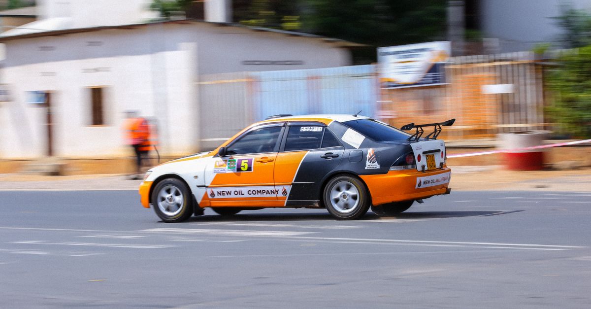 Lexus IS Race Car on Track · Free Stock Photo