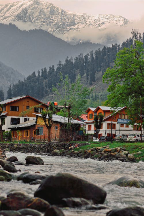 Scenic Mountain Village and a River 