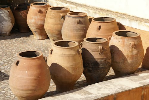 Large Clay Jars Displayed in a Yard