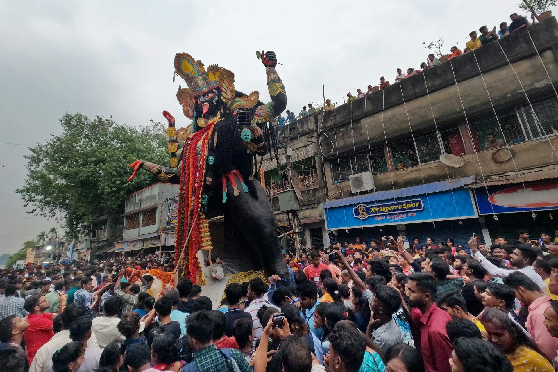 Crowd with God Statue at Festival in India