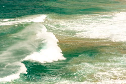 View of Foamy Waves on a Sea 