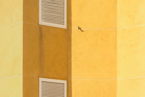 Ventilation on a Yellow Wall