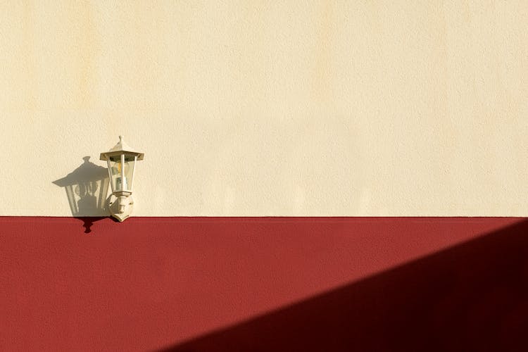 Lamp On A White And Red Wall