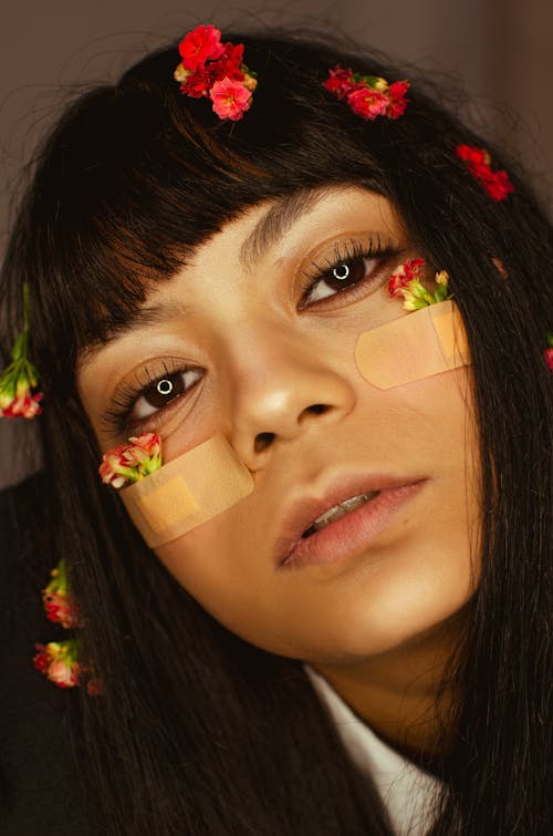 Portrait of Woman with Flowers on Her Face 