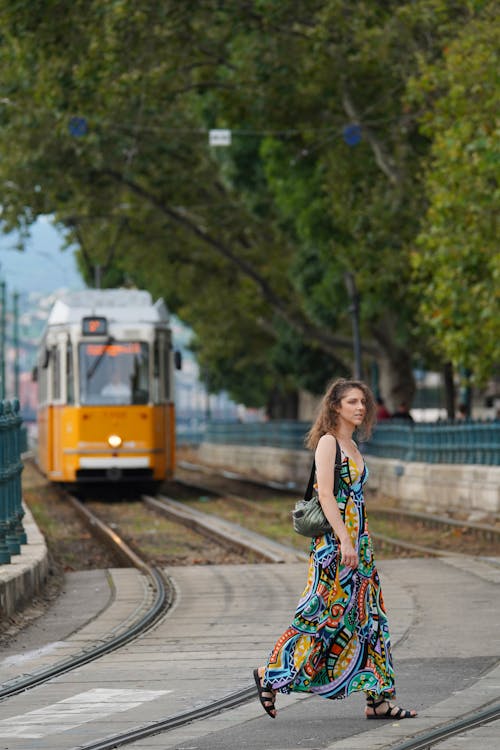 A Woman Crossing a Street