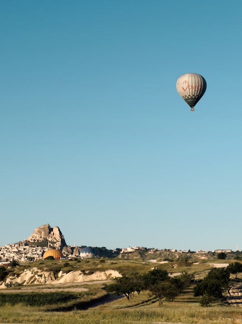 Hot Air Balloon Flying over Cappadocia in Turkey 