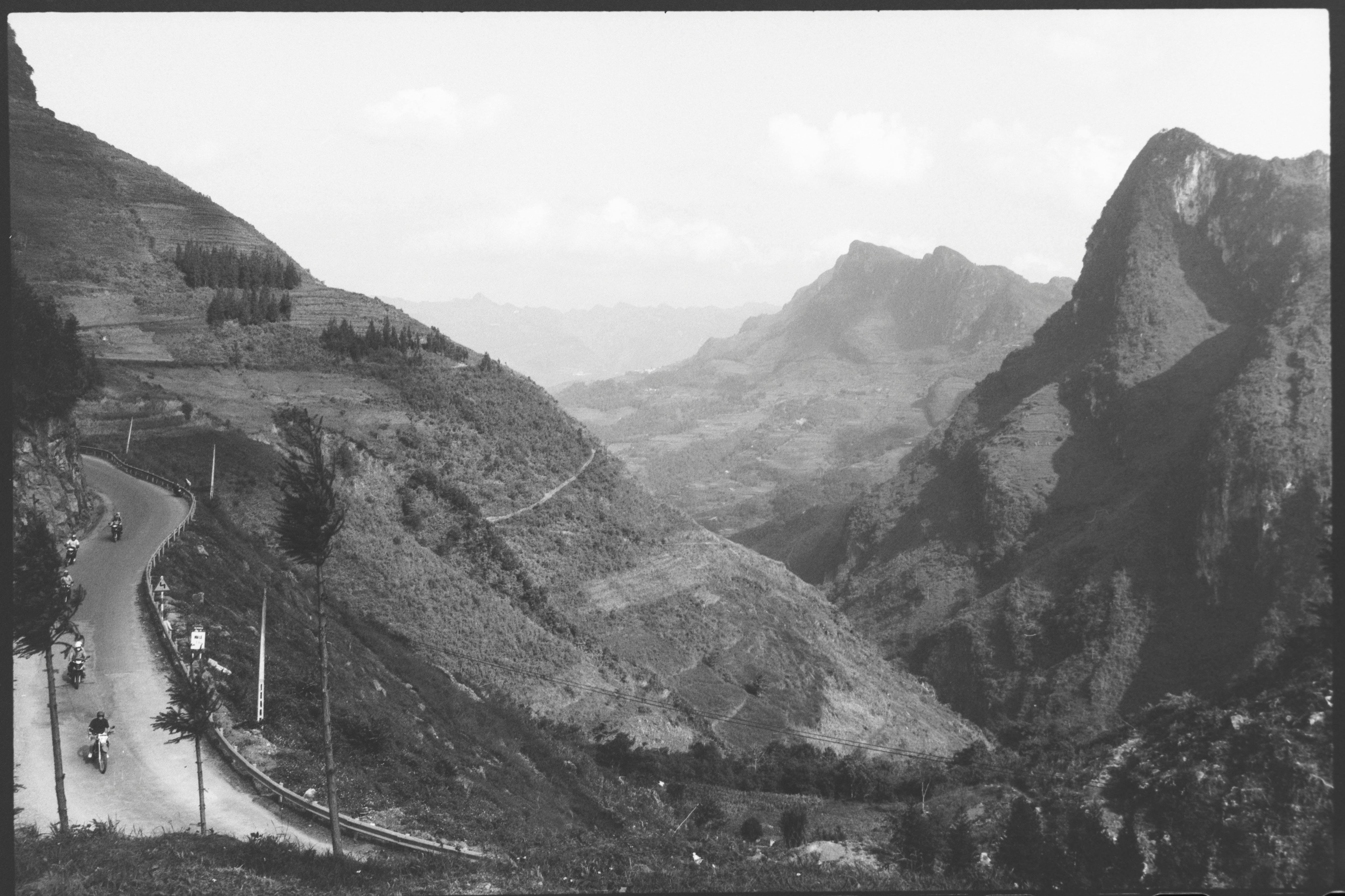 Scenic aerial view of Hà Giang mountains and winding roads in Vietnam.
