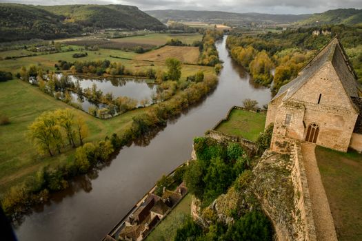 Scenic view of Chateau de Beynac and river in autumn, France.