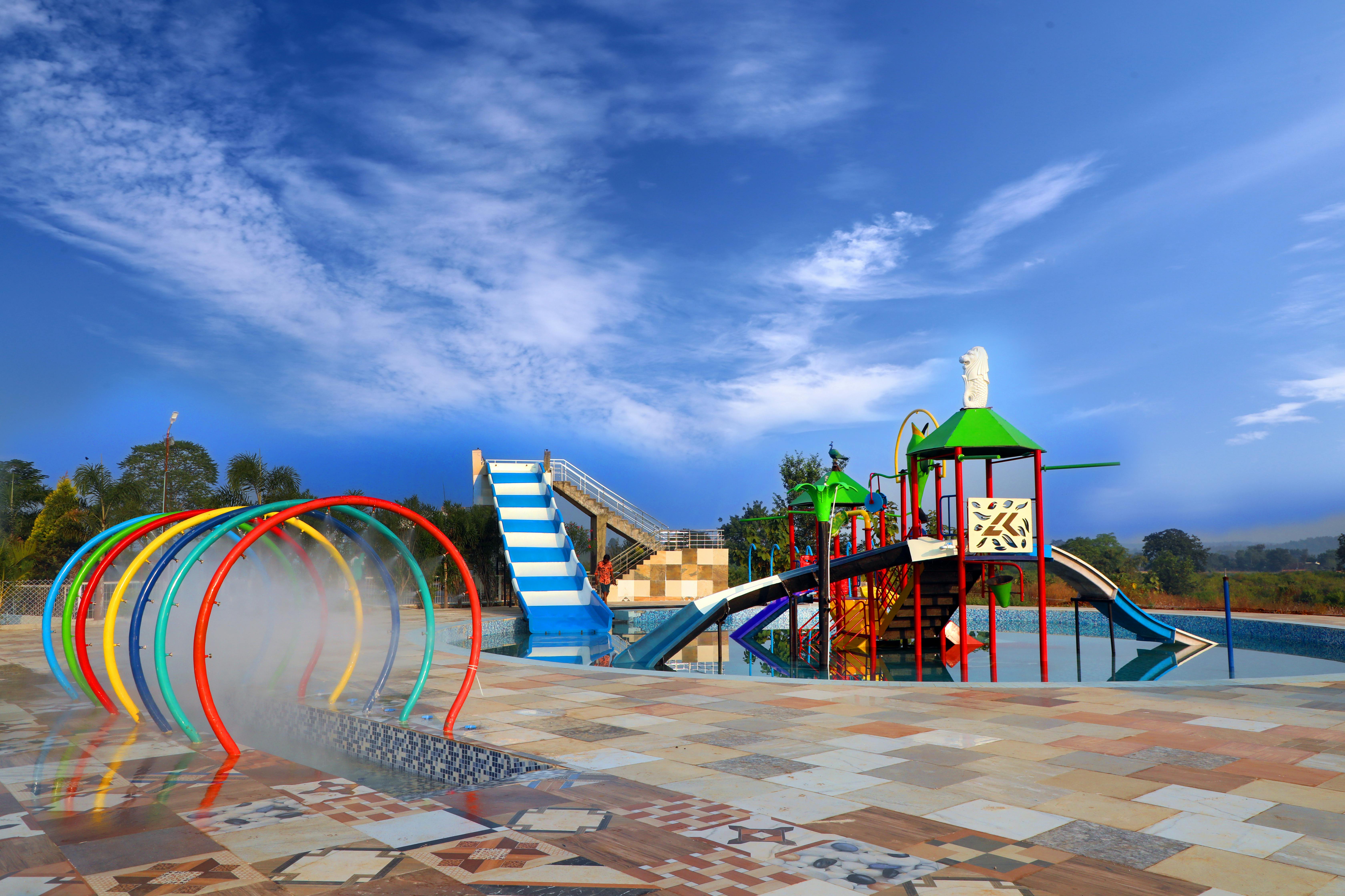 Swimming Pool with Playground in Resort · Free Stock Photo
