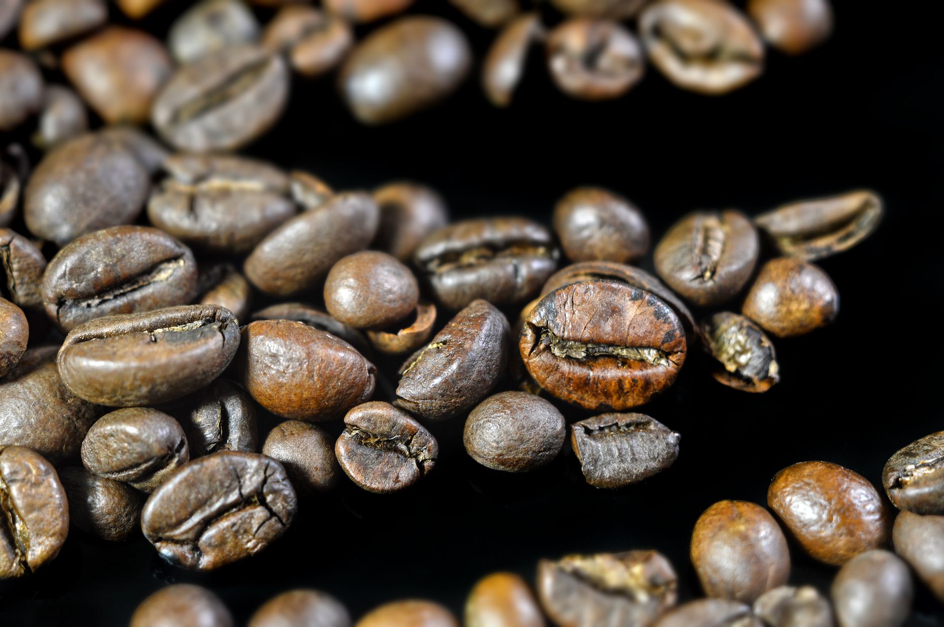 Pouring espresso coffee from a manual espresso maker