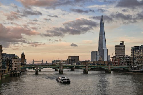 Bridge by the Thames in London During Sunset 